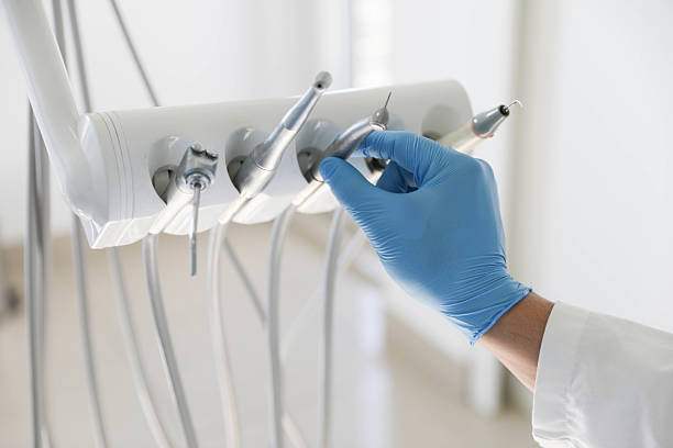 Professional Tooth Extraction technician working in Tifton, GA